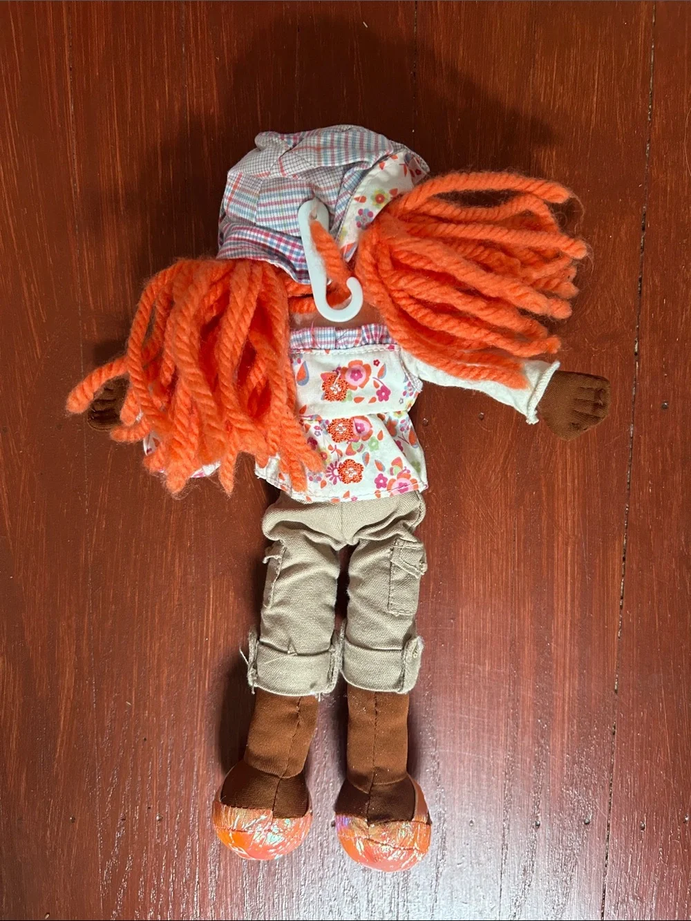 The Children's Place Brown Girl Rag Doll with Orange Yarn Hair and Floral Outfit